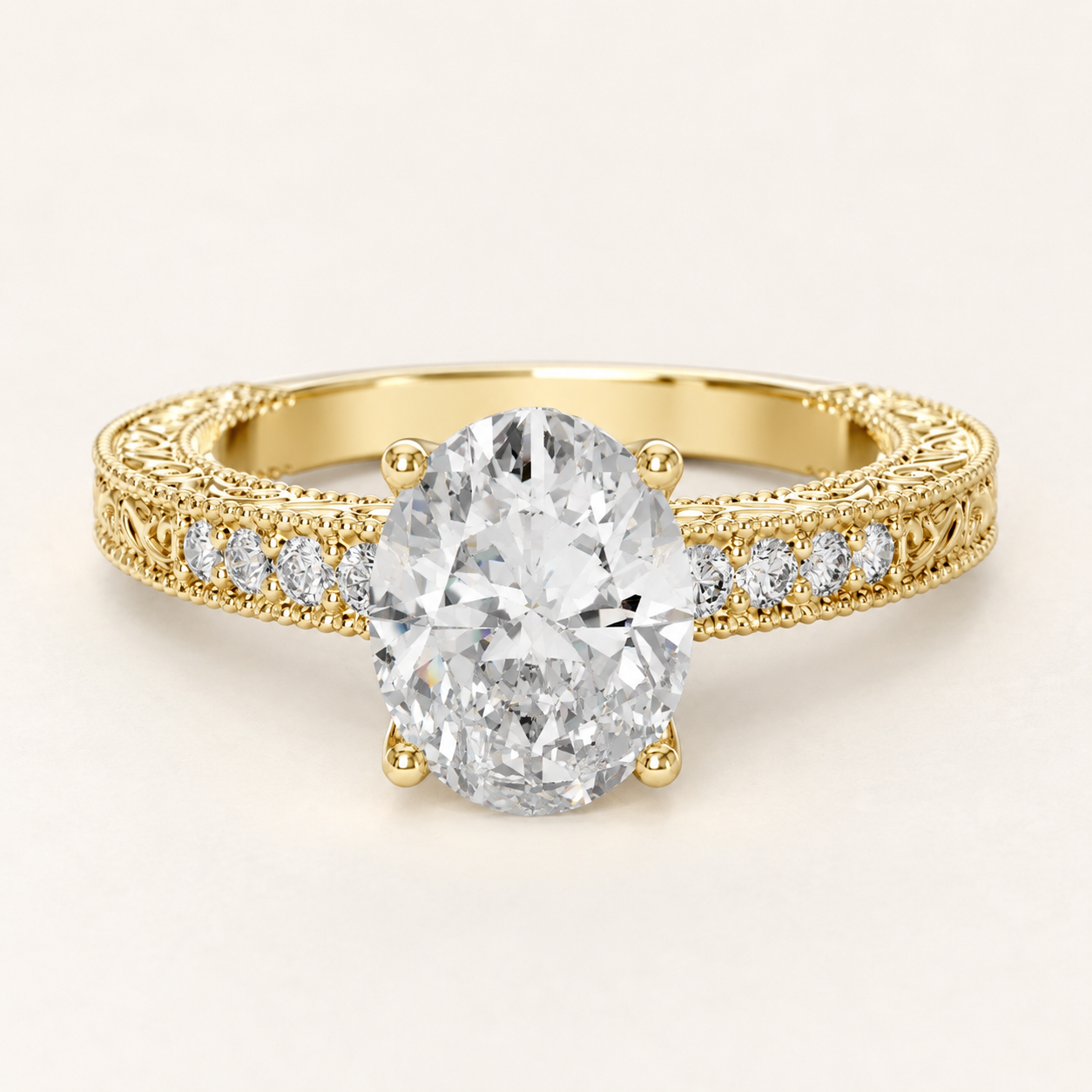 A yellow gold engagement ring featuring a large oval-cut center diamond and smaller diamonds set along the shoulders, shown on a clean off-white background.