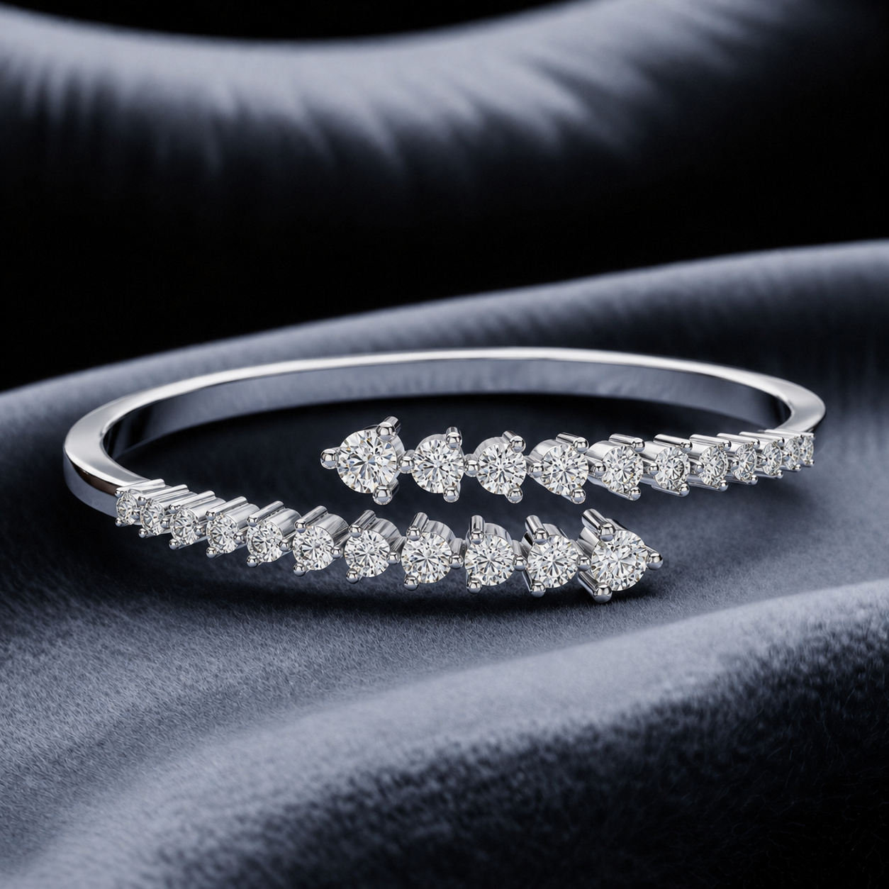 A silver-toned eternity-style ring with multiple rows of sparkling clear gemstones, photographed on dark draped fabric.