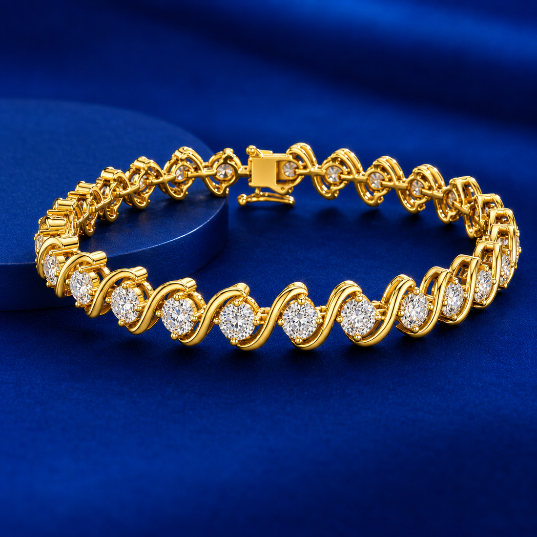 A yellow gold  tennis bracelet with round-cut clear stones, displayed on a dark blue circular pedestal against a matching blue background.