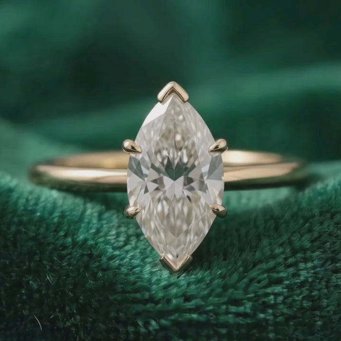 Marquise engagement ring available in yellow white and rose gold