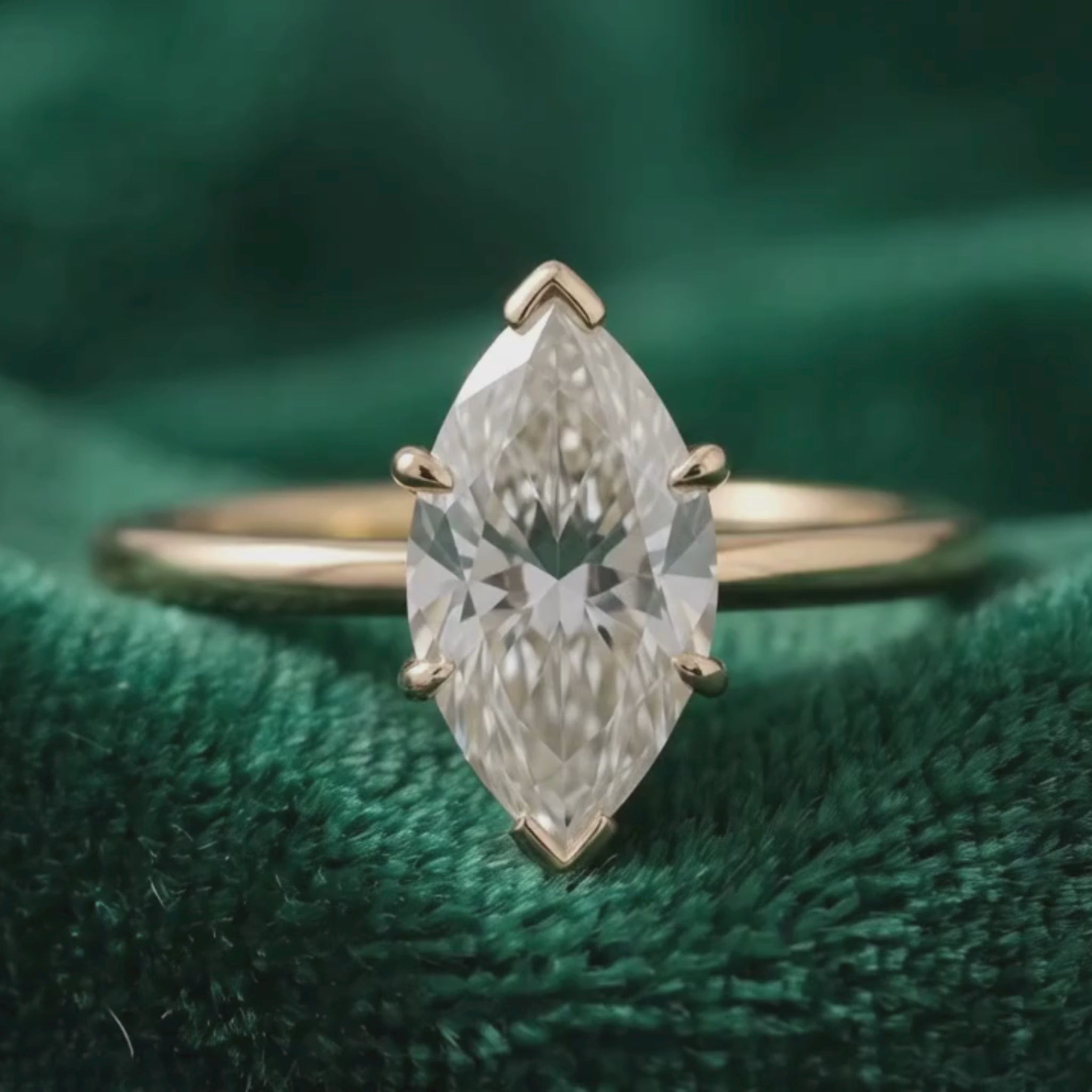 Marquise engagement ring available in yellow white and rose gold