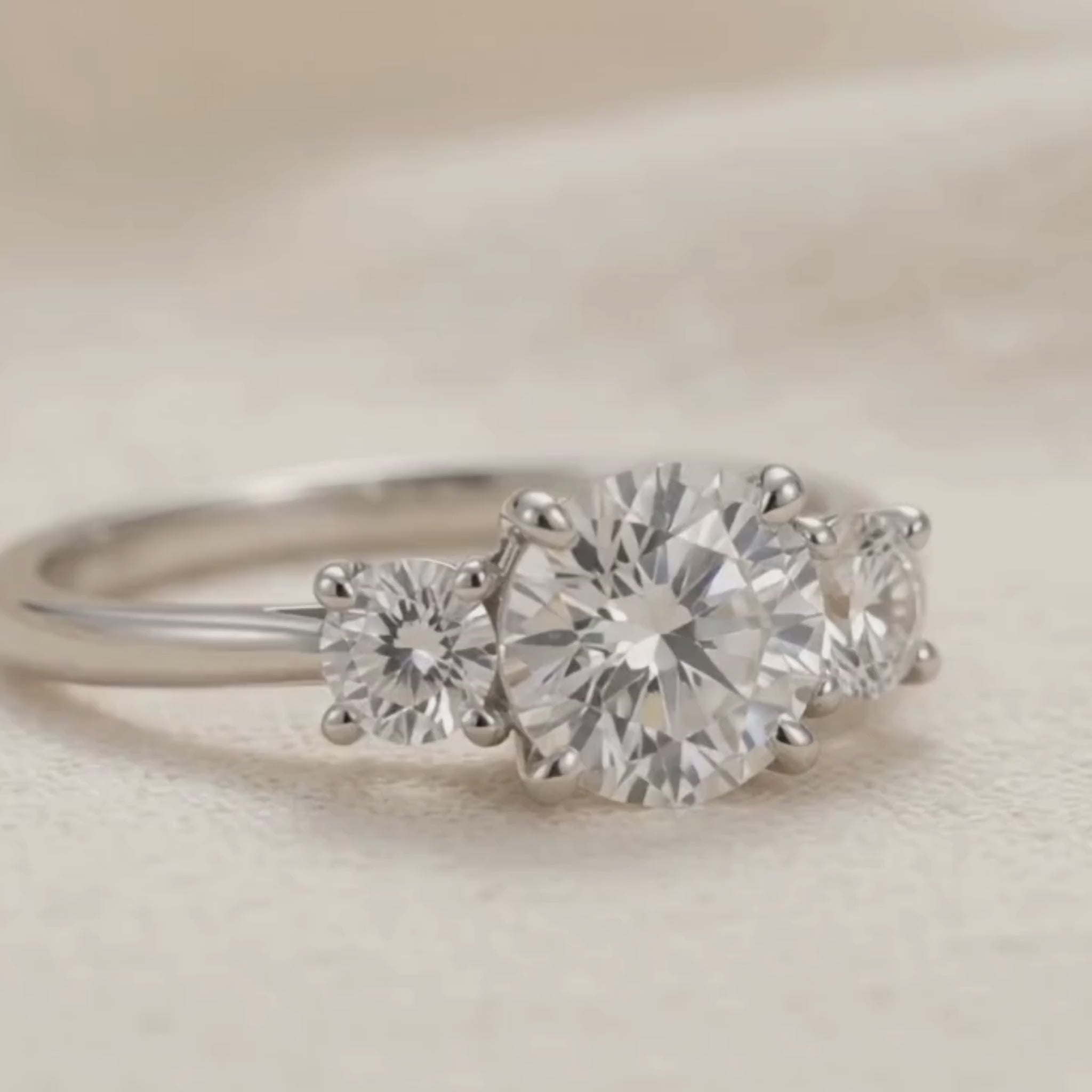 Three-stone engagement ring available in yellow white and rose gold